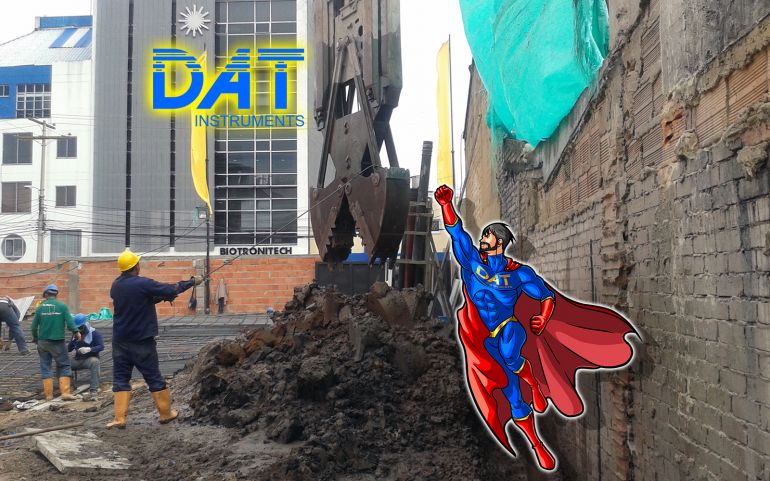 DAT instruments datalogger, scavo di diaframmi con personaggio DATman che vola ad aiutare, supereroe DAT-man
